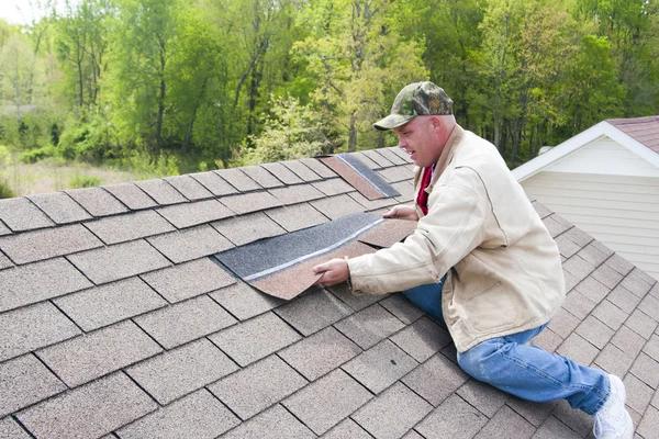 The Cost Factors of Roof Replacement in Rogers